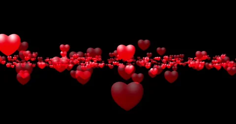 Red hearts flying along a flat surface on a black background Stock Footage 263717812