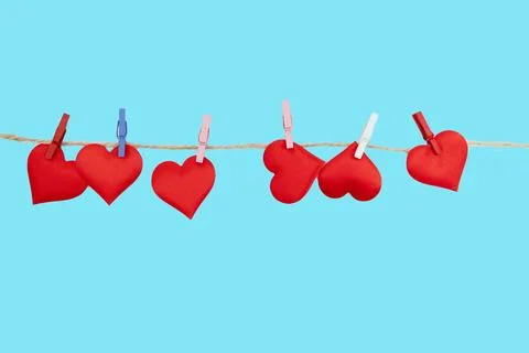 Red Hearts Hanging on a String for Valentines Day Digital Content Stock Photos
