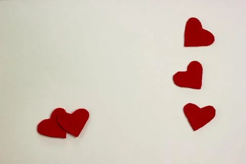 Red hearts on a light background. The concept of Valentine's day Stock Photos
