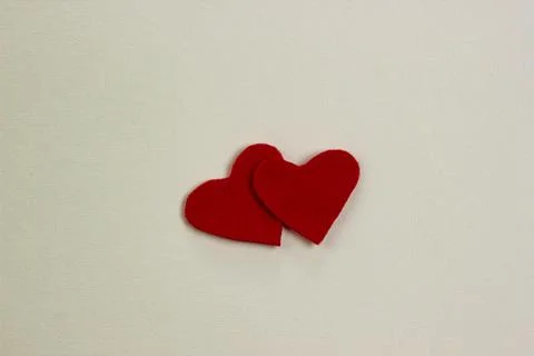 Red hearts on a light background. The concept of Valentine's day Stock Photos