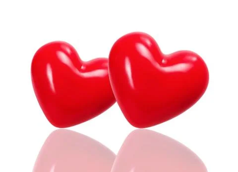 Red hearts on light background Fotos de archivo