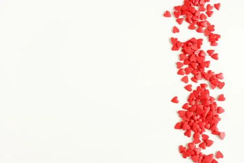 Red hearts pattern frame isolated on white background top view with copy space,  Stock Photos