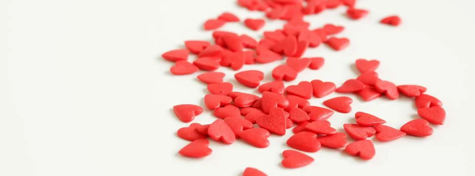 Red hearts pattern frame isolated on white background top view with copy space,  Stock Photos