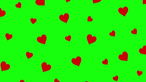 Red Hearts Pattern on Green Stock Footage 243925253