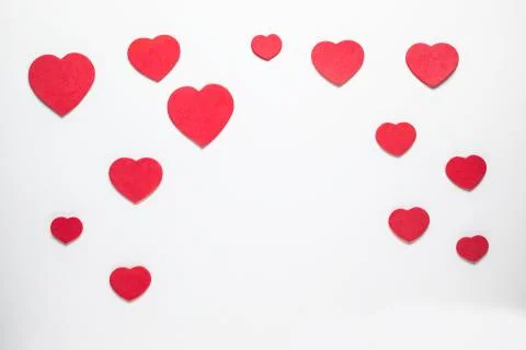 Red hearts on white background. Stock Photos