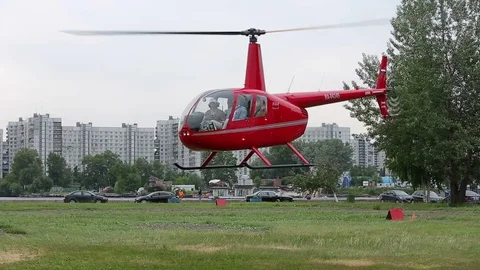 Red helicopter landing Video stock 72982602