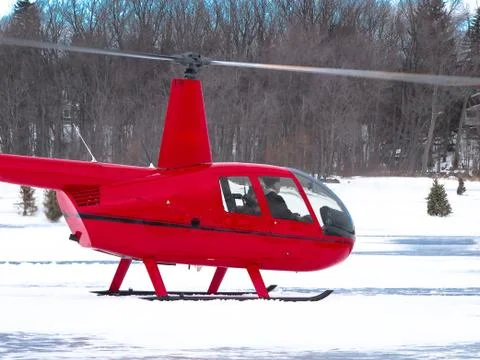 Red helicopter in winter Stock Photos