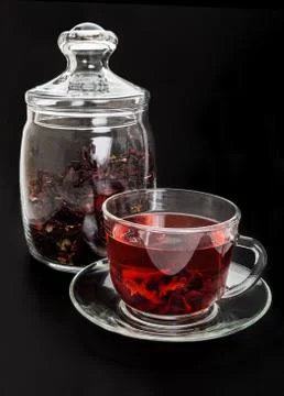 Red hibiscus tea on black background Stock Photos