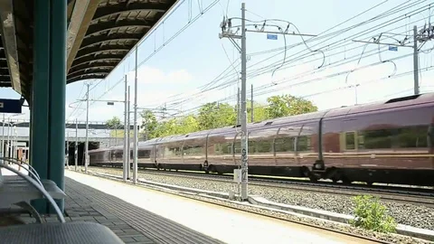 A red high speed train in a station Stock Footage 80080755