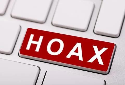 Red "HOAX" key on a computer keyboard, symbolizing misinformation, fake new.. 스톡 사진