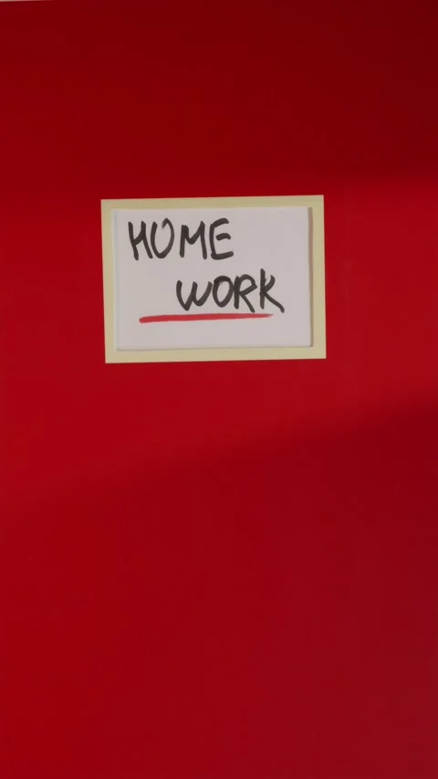 Red Home Work notebook folder flat lay on wooden table Stock Footage 341246054