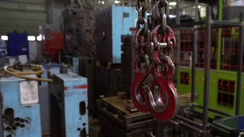 Red hook hang on chain and reeling Stock Footage 76900760
