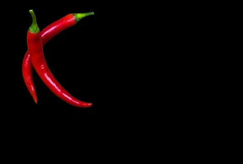 Red hot chilli pepper isolated on black background. Stock Photos