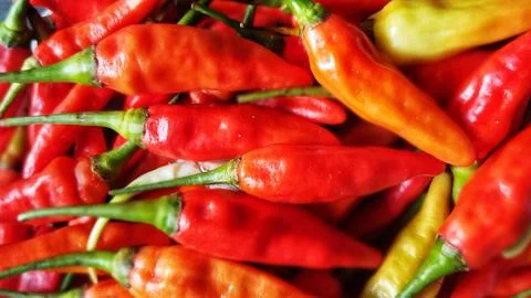 Red Hot Chilli Peppers' pattern, texture, and background. Close up. Landsca.. Stock Photos