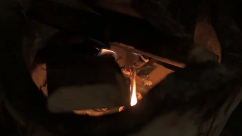 Red hot fire charcoal with burning tree leaves Stock Footage 121133200