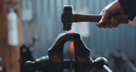 Red hot iron in a vice Stock Footage 105307418