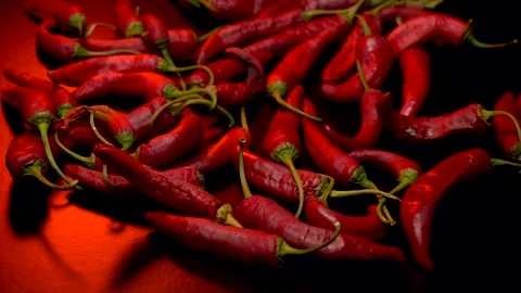 Red hot pepper in a dark studio Stock Footage 283721782