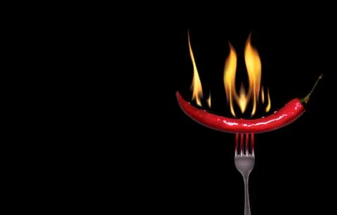 Red hot pepper on a fork Foto stock