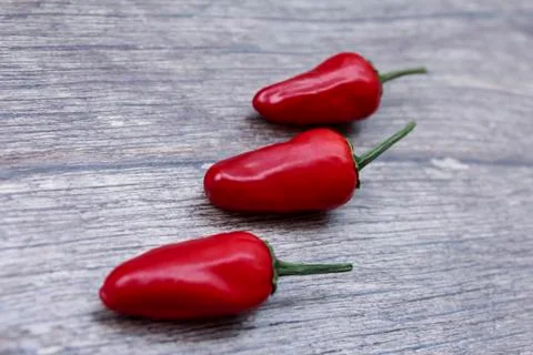 Red hot pepper on the kitchen table Stock Photos