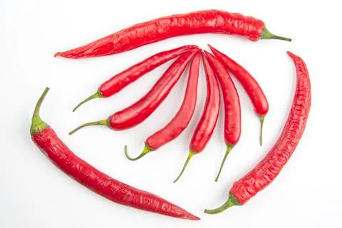 Red hot pepper on white background. Healthy vegetable food and vitamins. Stock Photos