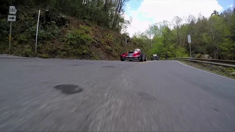 Red hot rod on road Stock Footage 85022094
