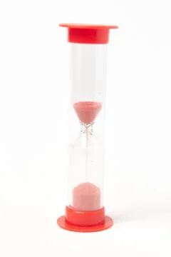 Red hourglass on a white background isolate Foto stock