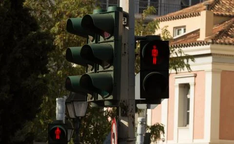Red human traffic light Stock Photos