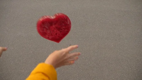 Red ice heart fall on the ground Stock Footage 91073809