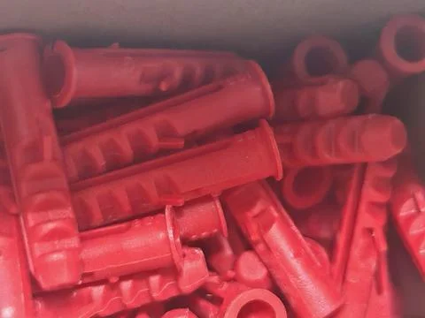 Red Industrial Components with Repeating Cylindrical Forms 写真素材