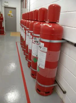 The red inflammable cylinder Stock Photos