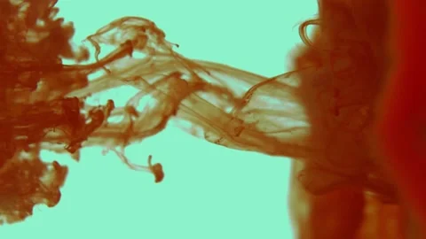 Red ink on a blue background in the water. Stock Footage 196829345