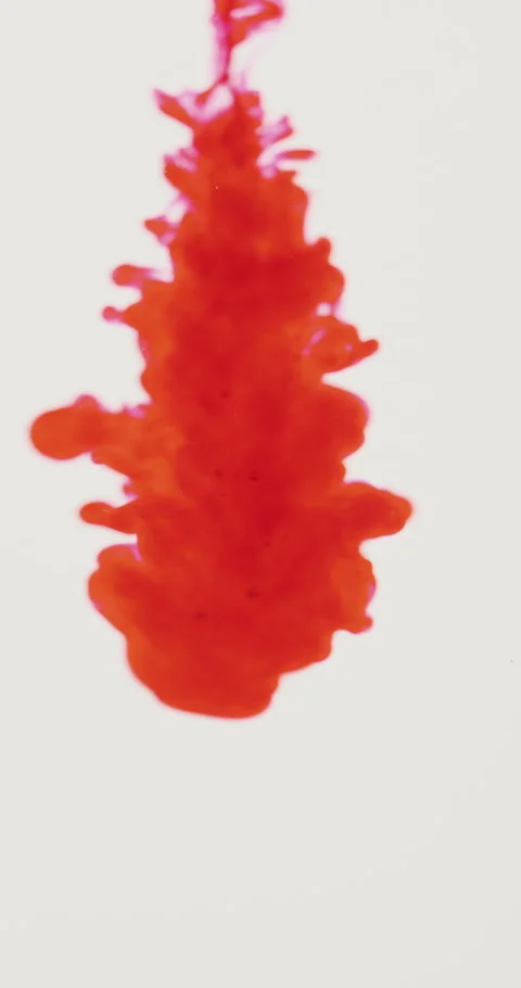 Red ink clouds floating slowly in the water Stock Footage 339007603