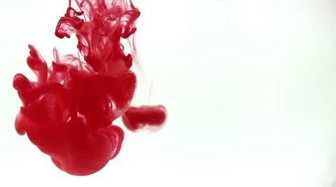 Red ink dissolves in water Stockbeeldmateriaal 8849348