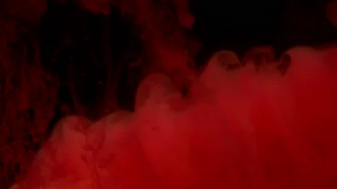 Red ink dissolves in water. red smoke. slow motion. Stock Footage 127584631