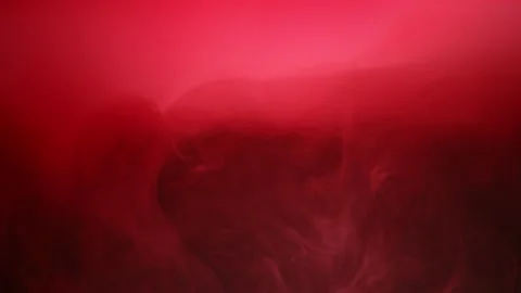 Red ink dissolves in water. red smoke. slow motion. Stock Footage 131938476