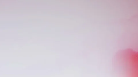 Red ink dissolving in water Stock Footage 100023456