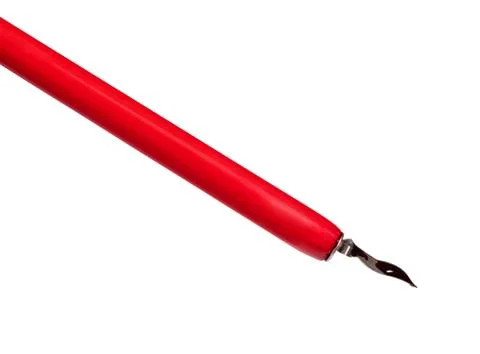 Red ink drop above sharp nib of dip pen Stock Photos
