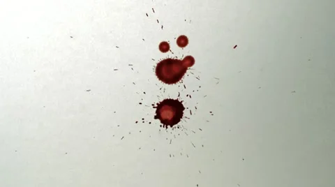 Red ink drops on white paper, Slow Motion Stock Footage 22227465