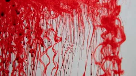 Red ink spreading in water Stock Footage 64346540
