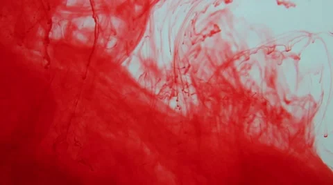 Red ink in the water Stock Footage 64347353