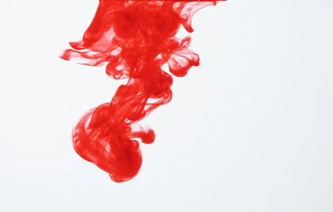 Red ink in water Stock Photos