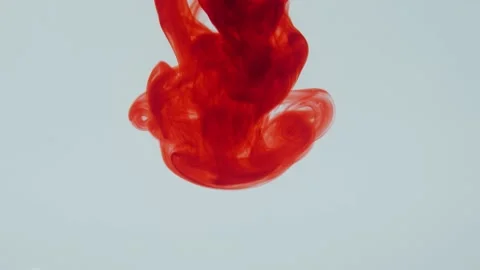 Red ink in a white water background slow motion Stock Footage 238922708