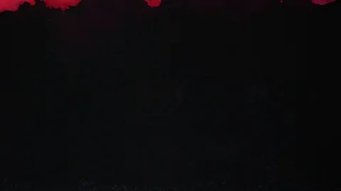 Red inky cloud diffuses in water in slow motion on black background and falling Video stock 106363133