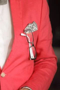 Red jacket handkerchief glasses in buttonhole Stock Photos