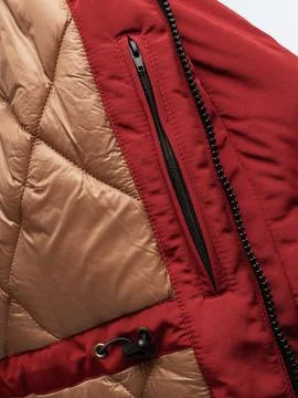 Red jacket inner pocket zipper detail Stock Photos