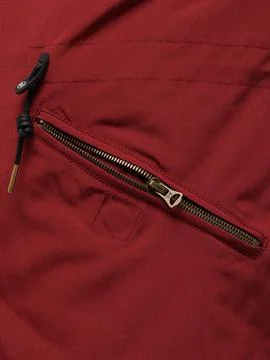 Red jacket zipper pull close up Stock Photos