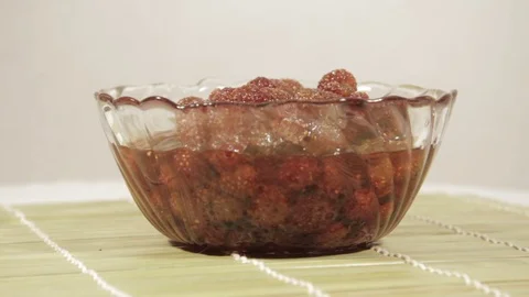 Red jam strawberry close up. Loop rotation Stock Footage 69947388