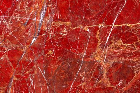 Red Jasper. Gemstone background. Matt natural semi precious mineral pattern Stock Photos