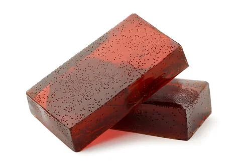 Red jelly cube on a white background. Isolated Stock Photos