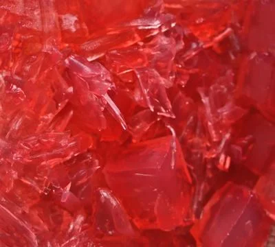 Red jelly texture background. Close up. Selective focus. Stock-Fotos